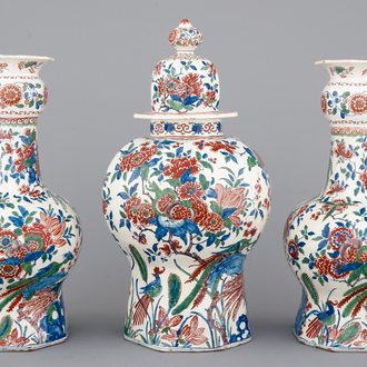 An exceptionally tall Dutch Delft garniture in cashemire palette, ca. 1700